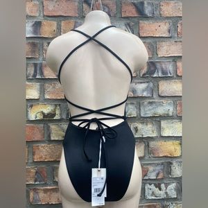 Good American brand black one piece swimsuit.